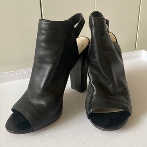Black leather 4.5 inch Vince Camuto open toe heels. Size 8.